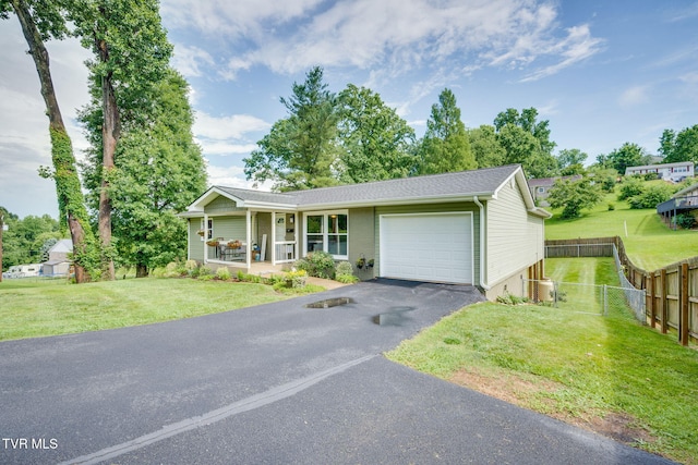 1933 Sand St, Kingsport, TN 37660 - view of front of property with covered porch, a garage, and driveway