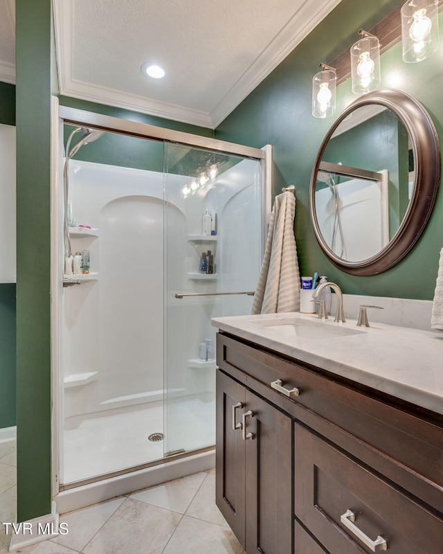 1933 Sand St, Kingsport, TN 37660 - full bathroom with crown molding, vanity, a shower stall, tile patterned floors, and a textured ceiling