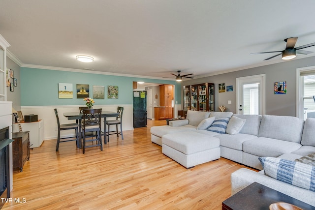 1933 Sand St, Kingsport, TN 37660 - living area with ceiling fan, light wood-style flooring, and ornamental molding