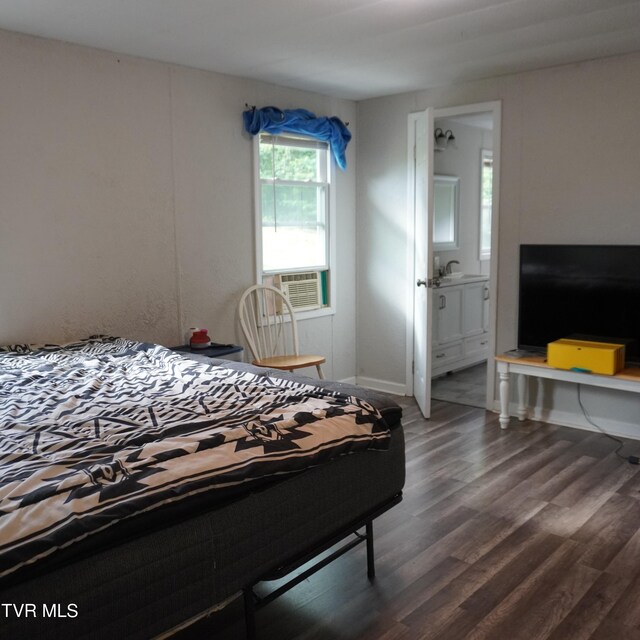 206 Hialeah Dr, Kingsport, TN 37660 - bedroom featuring cooling unit, dark wood finished floors, and ensuite bath