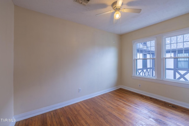 701 W Locust St Unit 34, Johnson City, TN 37604 - empty room with wood finished floors and a ceiling fan