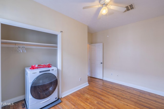 701 W Locust St Unit 34, Johnson City, TN 37604 - washroom with washer / dryer, wood finished floors, and ceiling fan