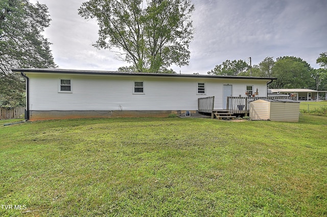 524 Boring Chapel Rd, Gray, TN 37615 - rear view of house featuring a storage shed and a wooden deck