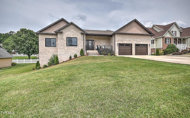 55 Farmstead Ln, Jonesborough, TN 37659 - view of front of property with board and batten siding, brick siding, driveway, and an attached garage
