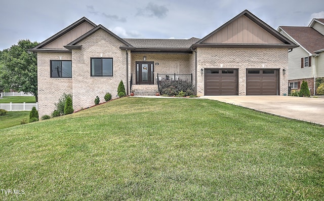 55 Farmstead Ln, Jonesborough, TN 37659 - view of front of property featuring board and batten siding, brick siding, an attached garage, and driveway