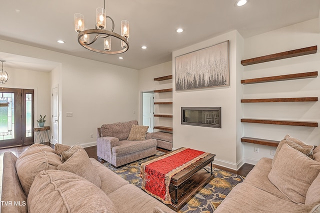 55 Farmstead Ln, Jonesborough, TN 37659 - living area with a chandelier, recessed lighting, dark wood finished floors, and a glass covered fireplace