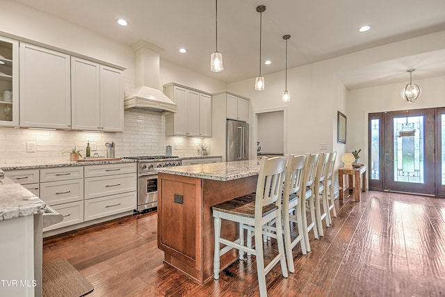 55 Farmstead Ln, Jonesborough, TN 37659 - kitchen with high quality appliances, premium range hood, tasteful backsplash, dark wood-style floors, and recessed lighting