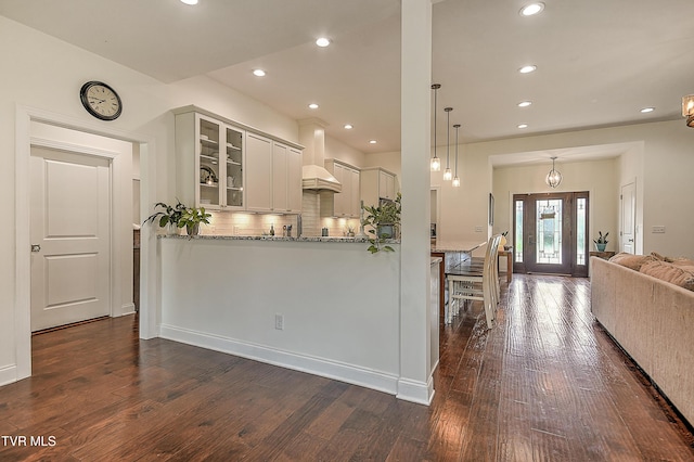 55 Farmstead Ln, Jonesborough, TN 37659 - kitchen featuring glass insert cabinets, backsplash, dark wood-type flooring, premium range hood, and light stone counters