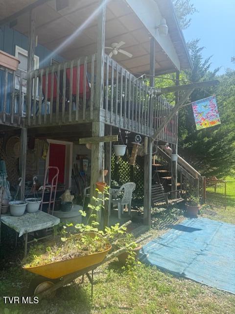 123 Mcmahan Gibbs Rd, Roan Mountain, TN 37687 - rear view of property featuring stairway, ceiling fan, a wooden deck, and a patio