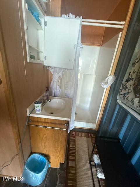 123 Mcmahan Gibbs Rd, Roan Mountain, TN 37687 - full bathroom with a stall shower and vanity