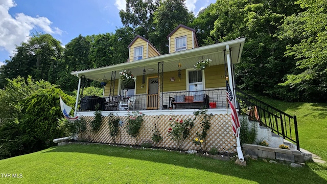 3135 3rd Ave, Saint Paul, VA 24283 - view of front of property featuring a porch, a front yard, and stairs