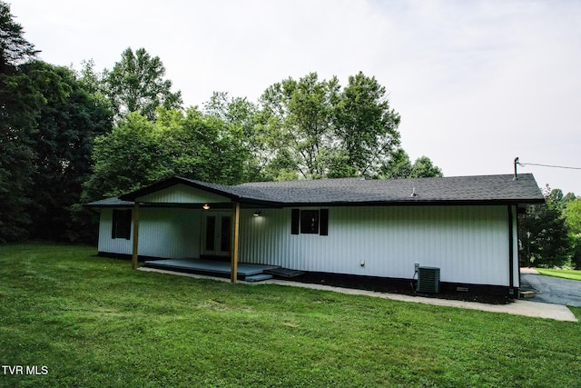 113 Paul Mathes Rd, Chuckey, TN 37641 - back of house with french doors, a lawn, a shingled roof, and crawl space