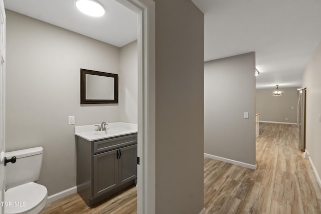 113 Paul Mathes Rd, Chuckey, TN 37641 - bathroom featuring wood finished floors, vanity, and a chandelier