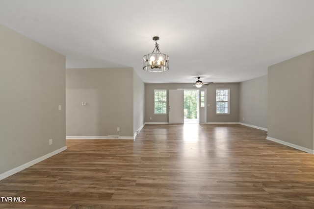 113 Paul Mathes Rd, Chuckey, TN 37641 - unfurnished room featuring a chandelier, wood finished floors, and ceiling fan