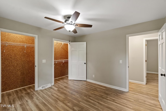 113 Paul Mathes Rd, Chuckey, TN 37641 - unfurnished bedroom featuring wood finished floors and a ceiling fan