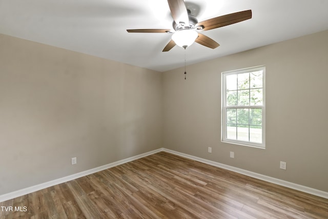113 Paul Mathes Rd, Chuckey, TN 37641 - unfurnished room featuring wood finished floors and a ceiling fan