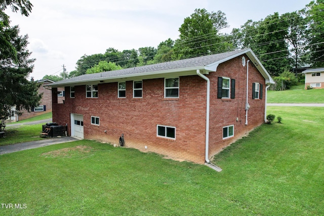 1908 Old Tusculum Rd, Greeneville, TN 37745 - view of property exterior featuring driveway, a yard, brick siding, and an attached garage