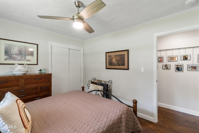 1908 Old Tusculum Rd, Greeneville, TN 37745 - bedroom with dark wood-type flooring, crown molding, a closet, and a ceiling fan