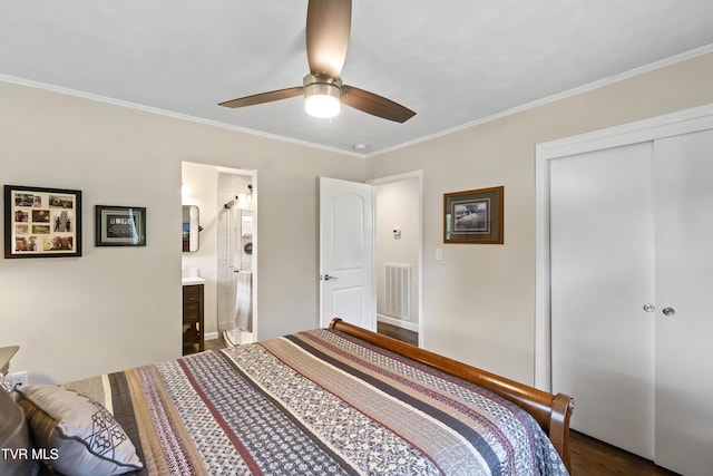 1908 Old Tusculum Rd, Greeneville, TN 37745 - bedroom with a closet, crown molding, dark wood-type flooring, a ceiling fan, and ensuite bathroom