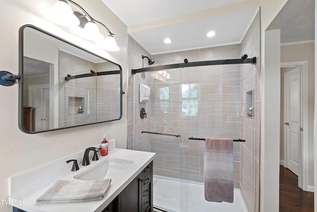 1908 Old Tusculum Rd, Greeneville, TN 37745 - bathroom with crown molding, vanity, a shower stall, and recessed lighting