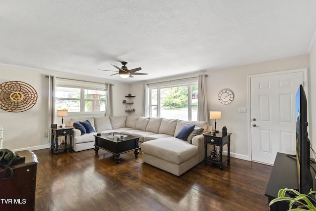 1908 Old Tusculum Rd, Greeneville, TN 37745 - living room featuring a ceiling fan, dark wood-type flooring, and a textured ceiling