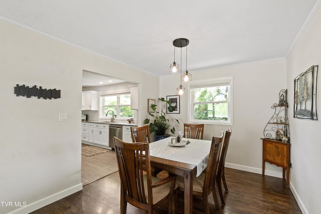 1908 Old Tusculum Rd, Greeneville, TN 37745 - dining area with dark wood finished floors and crown molding