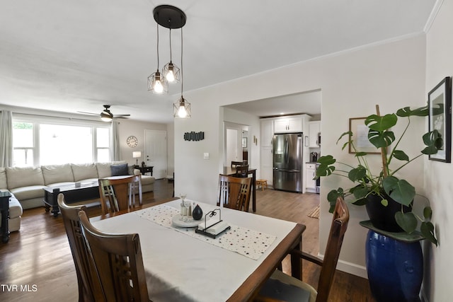 1908 Old Tusculum Rd, Greeneville, TN 37745 - dining area featuring wood finished floors, ceiling fan, and crown molding