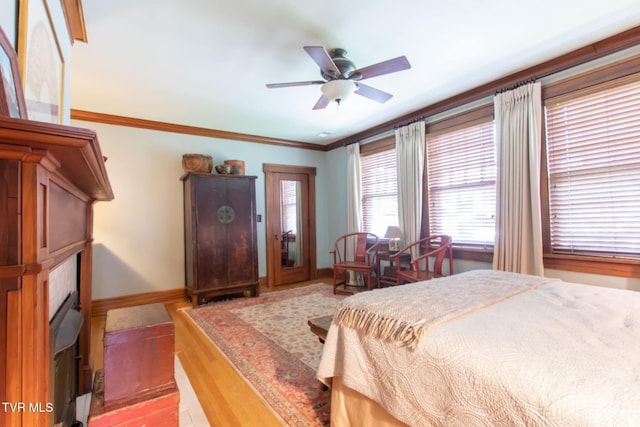 940 Park St, Bristol, VA 24201 - bedroom featuring ornamental molding, wood finished floors, and ceiling fan