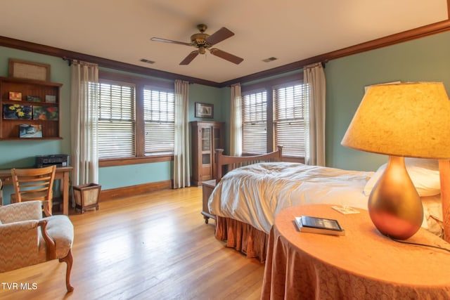 940 Park St, Bristol, VA 24201 - bedroom with ornamental molding and light wood-style flooring