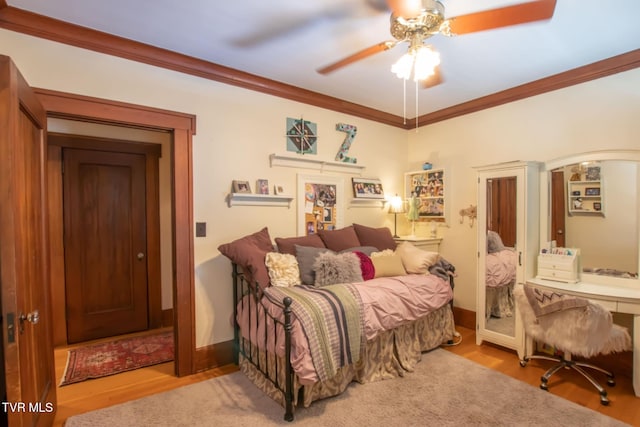 940 Park St, Bristol, VA 24201 - bedroom with crown molding, light wood finished floors, and ceiling fan