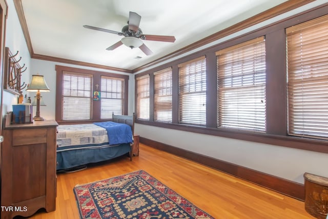 940 Park St, Bristol, VA 24201 - bedroom featuring crown molding, light wood-type flooring, and a ceiling fan