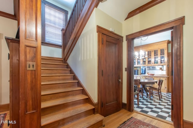 940 Park St, Bristol, VA 24201 - foyer entrance featuring stairway, a chandelier, and light wood-type flooring