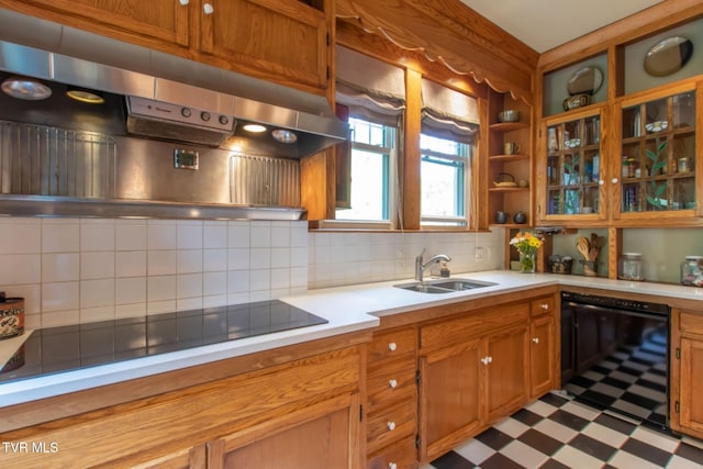 940 Park St, Bristol, VA 24201 - kitchen featuring black appliances, under cabinet range hood, tile patterned floors, decorative backsplash, and light countertops