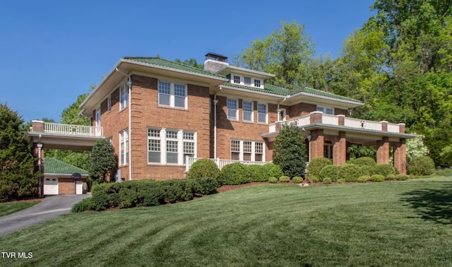 940 Park St, Bristol, VA 24201 - view of front facade with brick siding, a front lawn, and a chimney