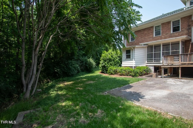 940 Park St, Bristol, VA 24201 - view of grassy yard with a sunroom