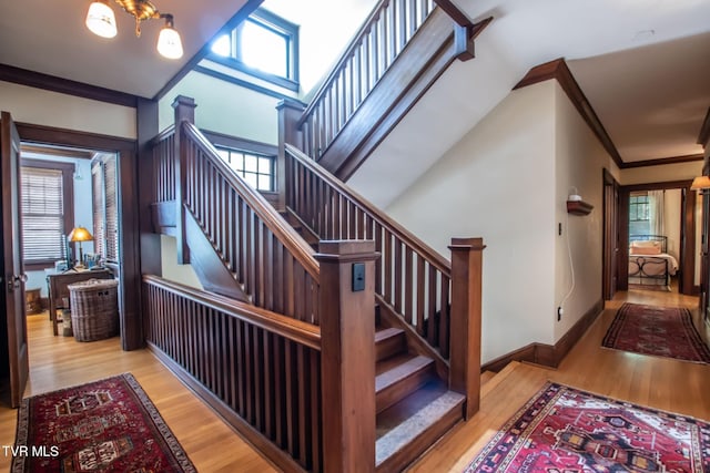 940 Park St, Bristol, VA 24201 - stairway with ornamental molding, wood finished floors, and plenty of natural light