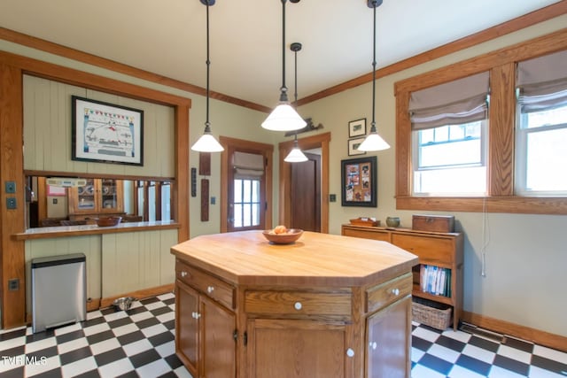 940 Park St, Bristol, VA 24201 - kitchen featuring dark flooring, wooden counters, and hanging light fixtures