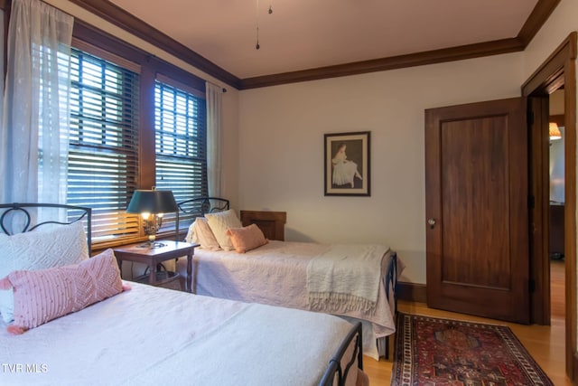 940 Park St, Bristol, VA 24201 - bedroom with crown molding and light wood finished floors