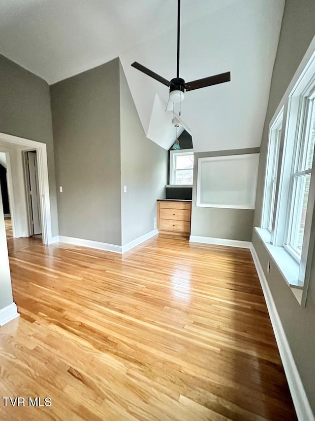 461 S Shady Ave, Damascus, VA 24236 - unfurnished living room with a ceiling fan, light wood-type flooring, and lofted ceiling