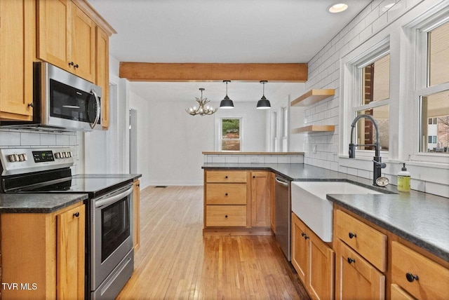 461 S Shady Ave, Damascus, VA 24236 - kitchen with appliances with stainless steel finishes, dark countertops, light wood-style floors, decorative backsplash, and recessed lighting
