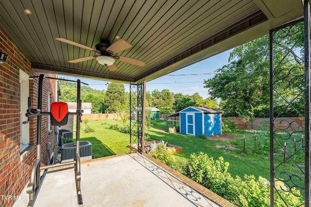 461 S Shady Ave, Damascus, VA 24236 - fenced backyard with a patio area, a shed, and a ceiling fan