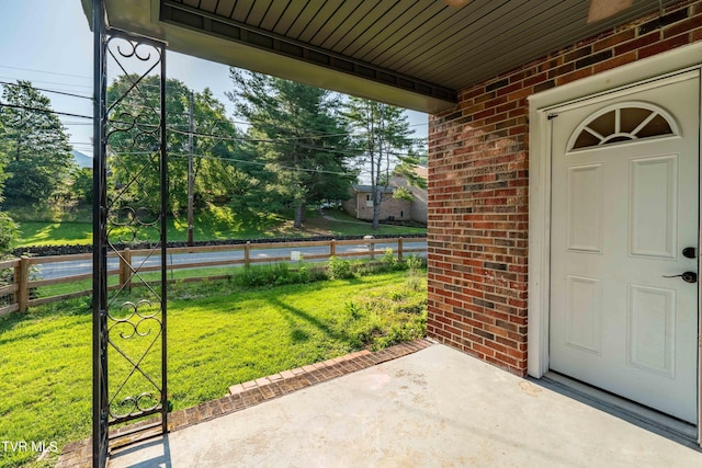 461 S Shady Ave, Damascus, VA 24236 - doorway to property featuring brick siding and a patio