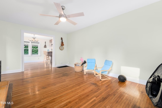 461 S Shady Ave, Damascus, VA 24236 - unfurnished room with wood-type flooring, a chandelier, and ceiling fan
