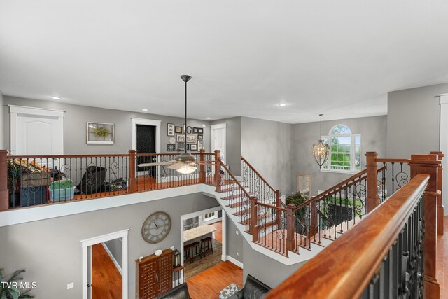 512 Shea Ct, Morristown, TN 37814 - staircase with recessed lighting, ceiling fan, a chandelier, wood finished floors, and a fireplace