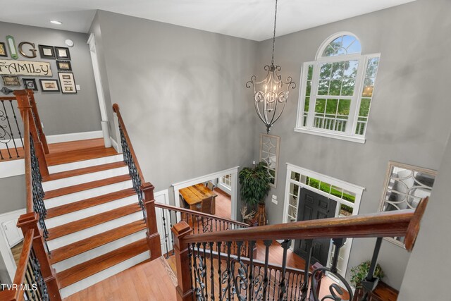 512 Shea Ct, Morristown, TN 37814 - staircase with wood finished floors, a chandelier, and recessed lighting