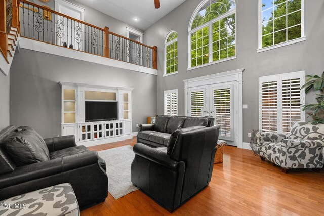 512 Shea Ct, Morristown, TN 37814 - living room with a towering ceiling, hardwood / wood-style floors, french doors, and ceiling fan