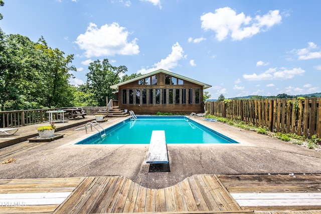 274 Hickam Orchard Rd, Kingsport, TN 37660 - view of swimming pool with a deck, a diving board, a fenced backyard, and a patio area