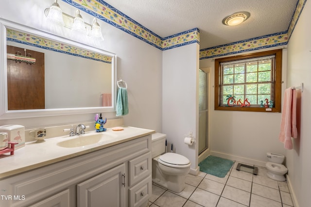 274 Hickam Orchard Rd, Kingsport, TN 37660 - full bathroom with a textured ceiling, tile patterned floors, vanity, and a shower stall