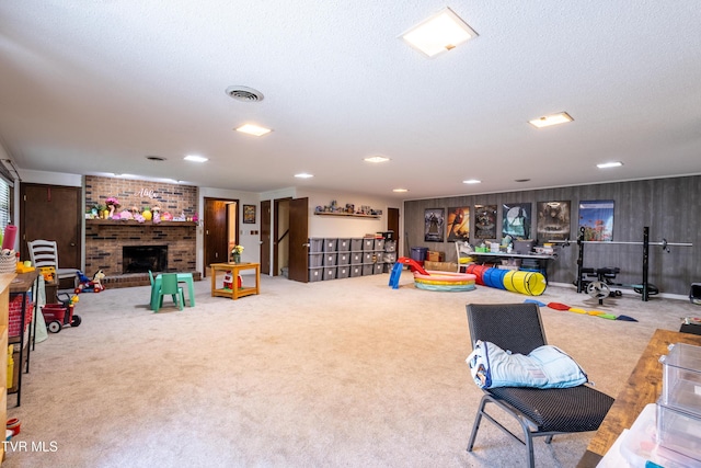 274 Hickam Orchard Rd, Kingsport, TN 37660 - living room with carpet floors, a brick fireplace, a textured ceiling, and recessed lighting