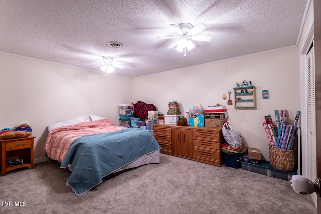 274 Hickam Orchard Rd, Kingsport, TN 37660 - carpeted bedroom with a ceiling fan, a textured ceiling, a closet, and crown molding